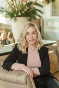 Female corporate headshot take in beautiful lounge